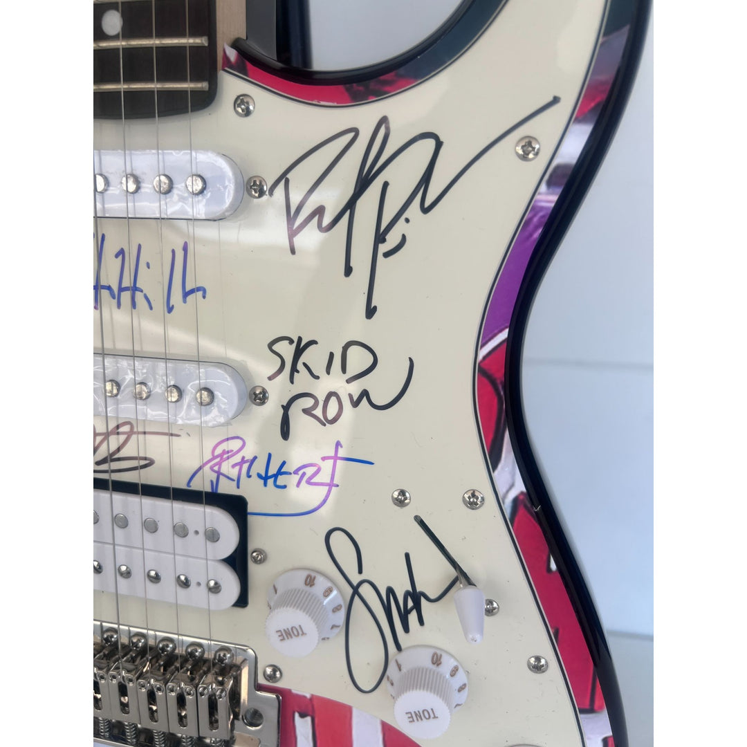 Skid Row Sebastian Bach Dave Sarbo, Sciottie Hill "one of a kind" full size electric guitar signed with proof.