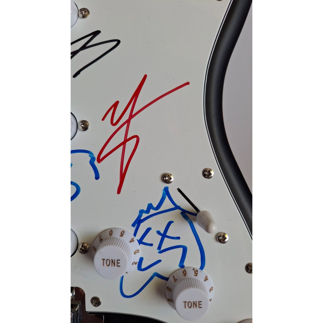 Motley Crue, Tommy Lee, Mick Mars, Nixxi Sixx, Vince Neal, Fender Stratocaster Squier electric guitar signed with proof