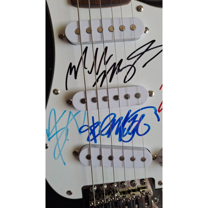 Motley Crue, Tommy Lee, Mick Mars, Nixxi Sixx, Vince Neal, Fender Stratocaster Squier electric guitar signed with proof
