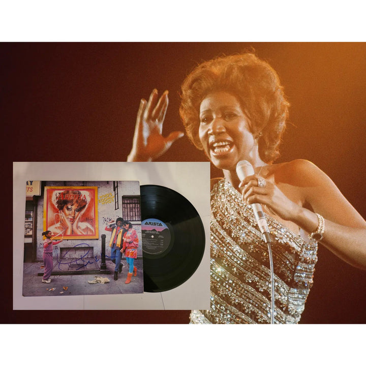 Aretha Franklin "Who's Zoomin' Who?" LP signed with proof.