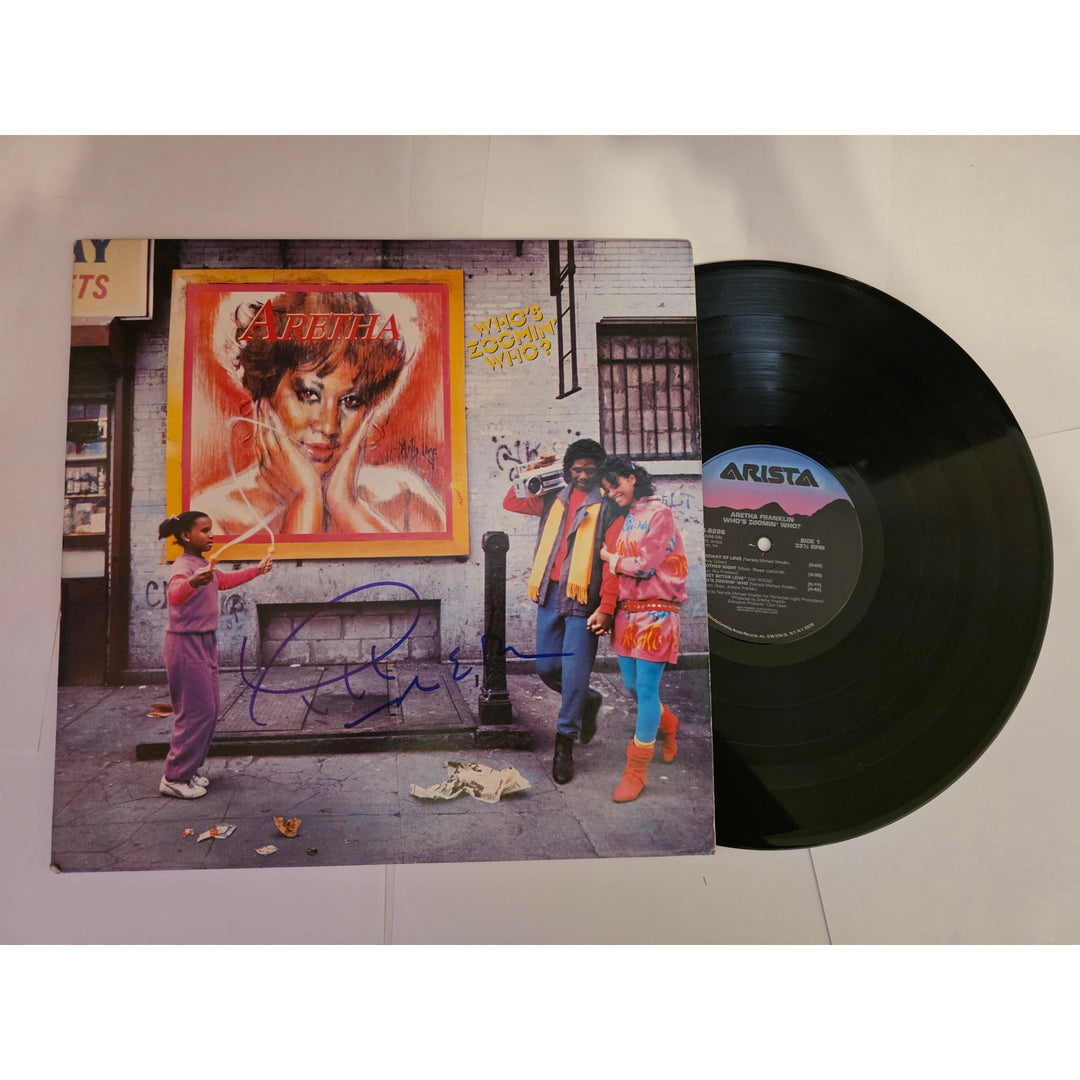 Aretha Franklin "Who's Zoomin' Who?" LP signed with proof.
