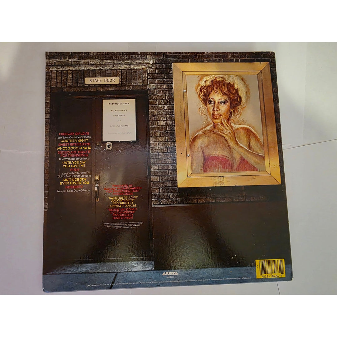 Aretha Franklin "Who's Zoomin' Who?" LP signed with proof.