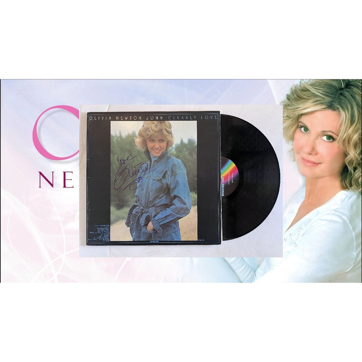 Olivia Newton-John clearly love original LP signed with proof