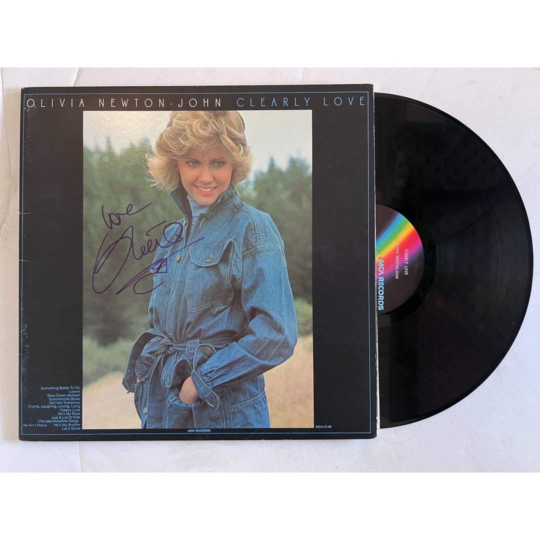 Olivia Newton-John clearly love original LP signed with proof