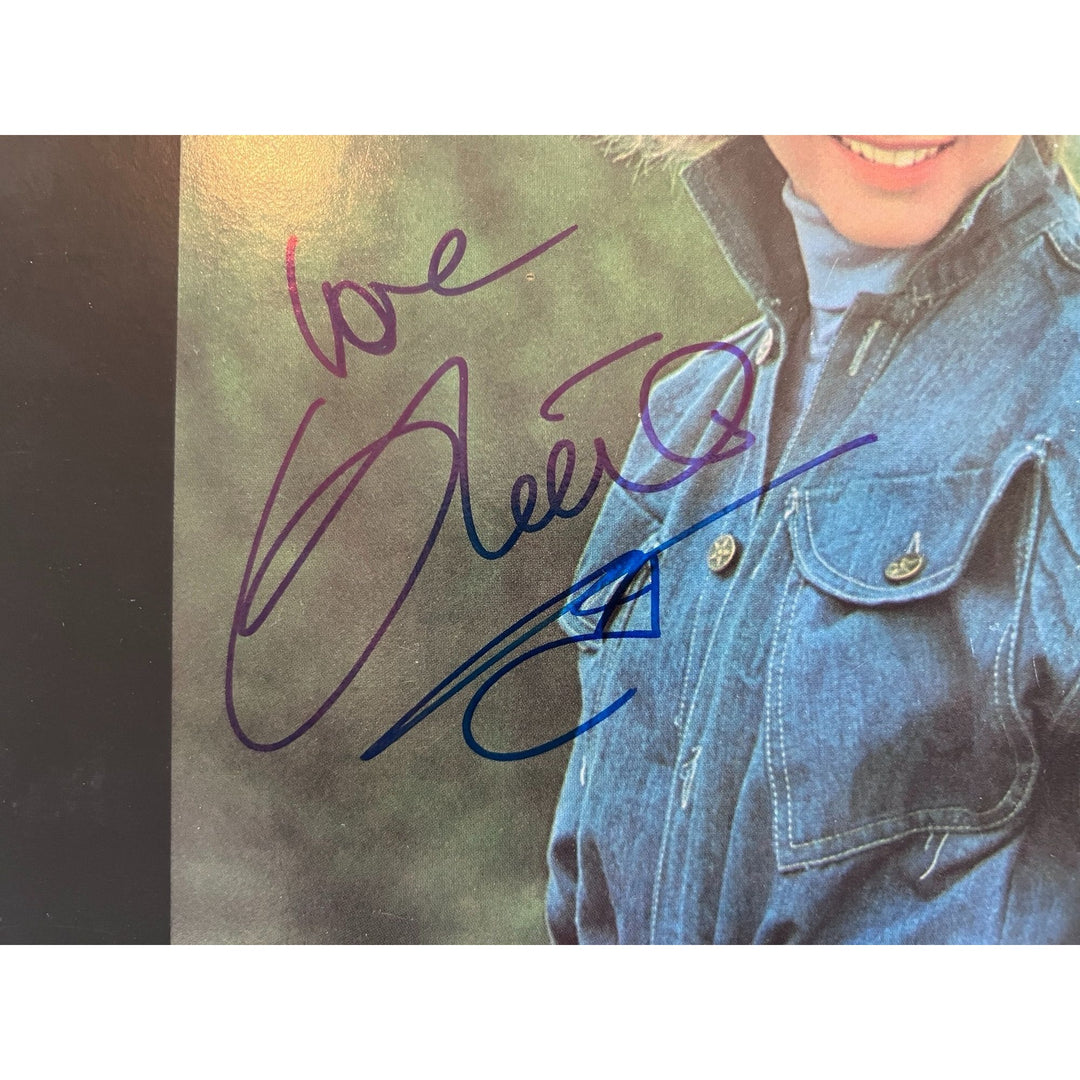 Olivia Newton-John clearly love original LP signed with proof