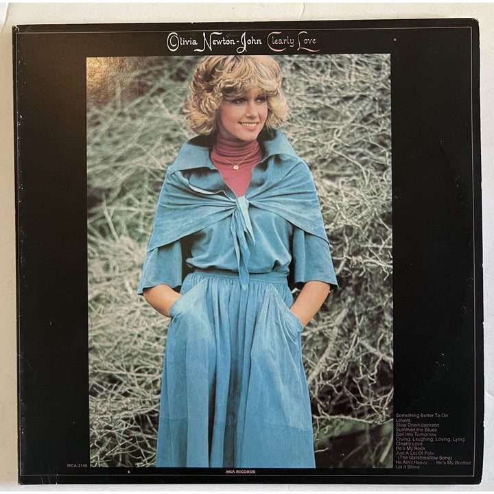 Olivia Newton-John clearly love original LP signed with proof