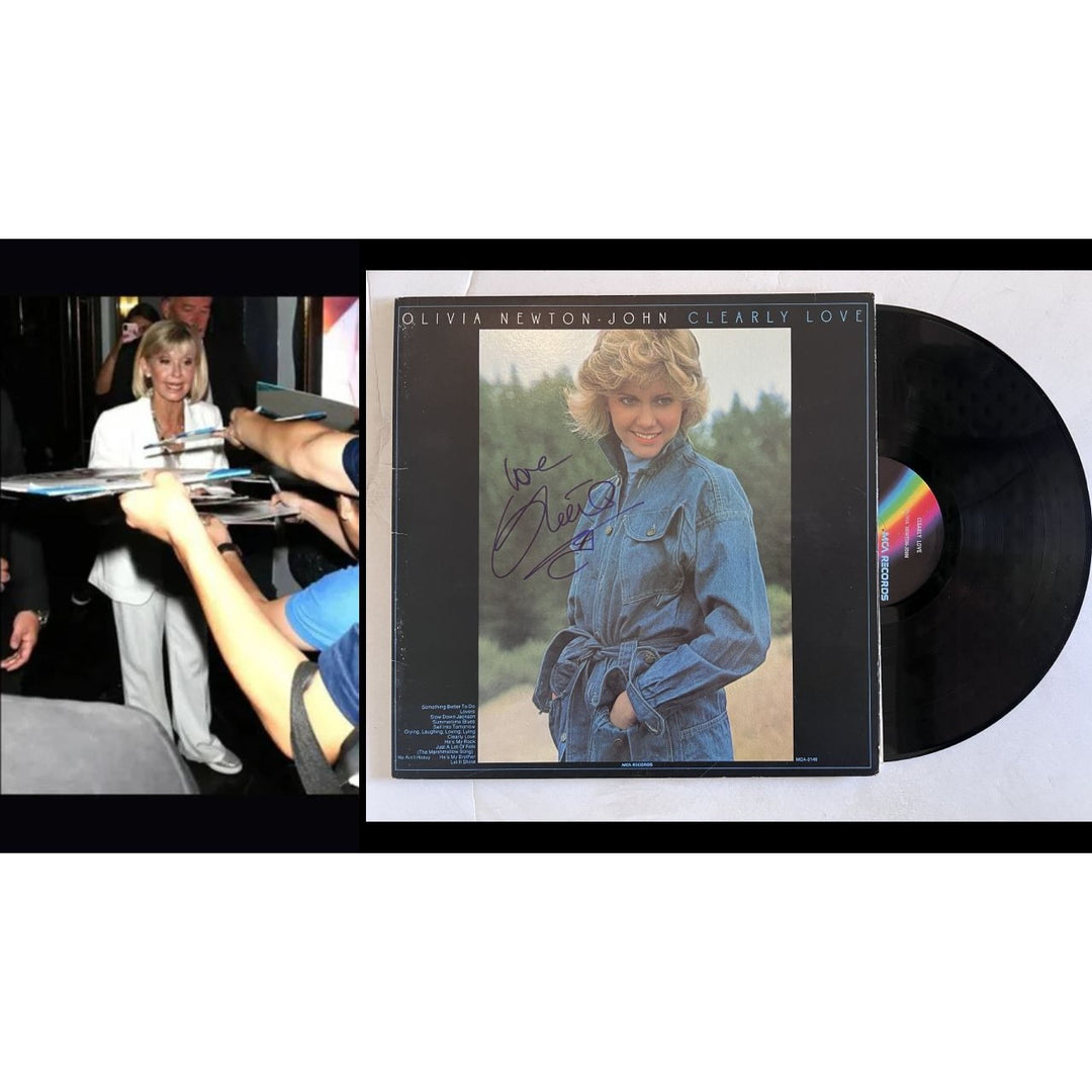 Olivia Newton-John clearly love original LP signed with proof