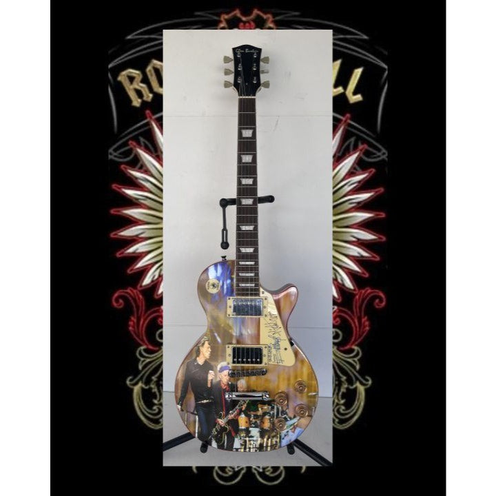 Rolling Stones Mick Jagger & Keith Richards one of a kind les paul (full size) electric guitar signed with proof.