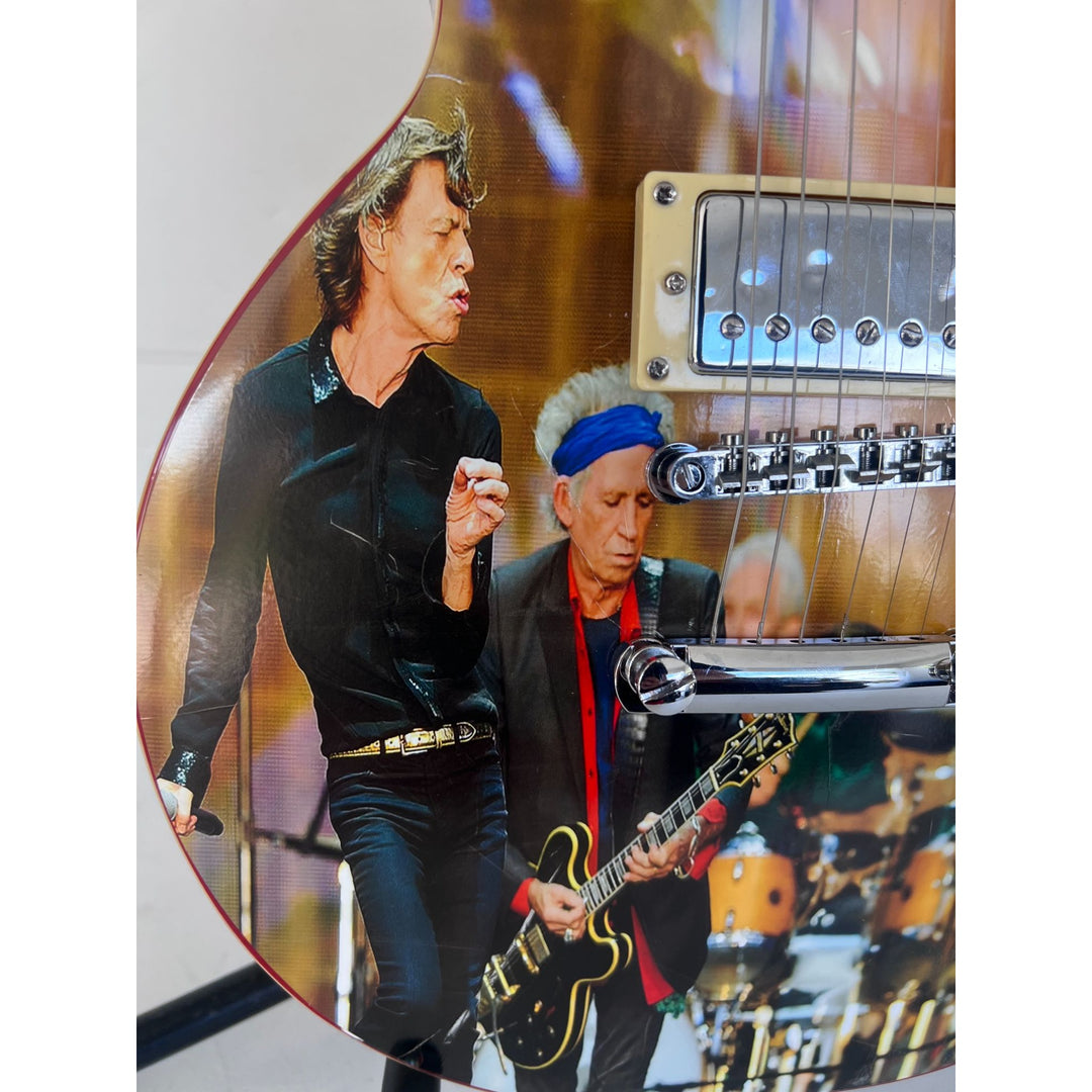 Rolling Stones Mick Jagger & Keith Richards one of a kind les paul (full size) electric guitar signed with proof.