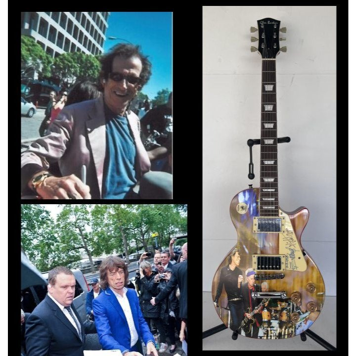Rolling Stones Mick Jagger & Keith Richards one of a kind les paul (full size) electric guitar signed with proof.