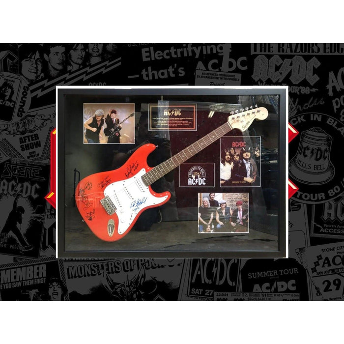 Angus and Malcolm Young Cliff Williams Phil Rudd Brian Johnston AC DC Stratocaster electric guitar signed and framed with photo proof