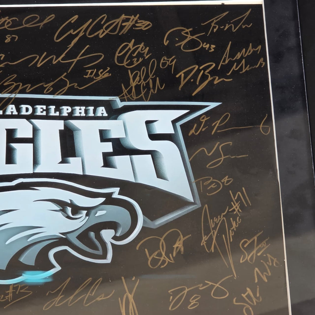 Philadelphia Eagles 2016-17 team signed 16x20 framed with proof.