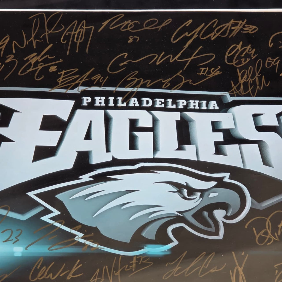 Philadelphia Eagles 2016-17 team signed 16x20 framed with proof.