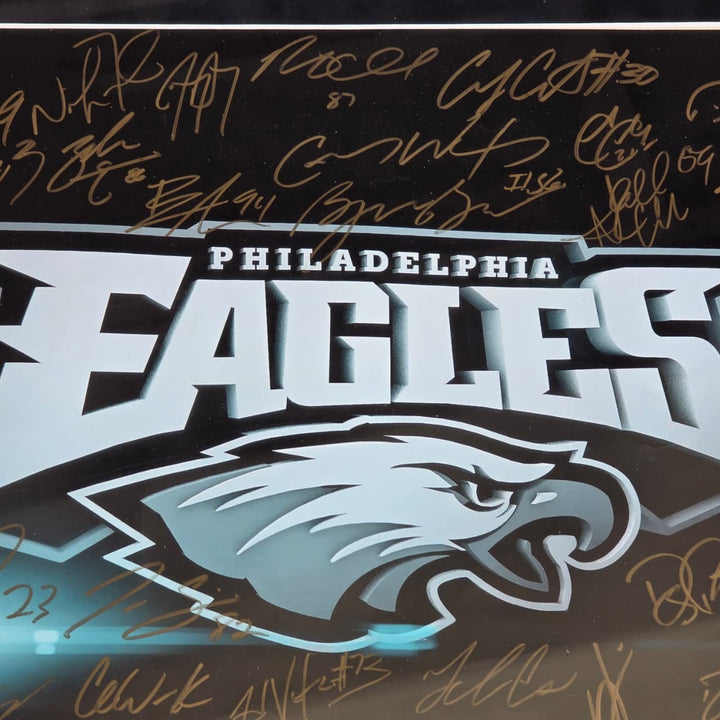 Philadelphia Eagles 2016-17 team signed 16x20 framed with proof.
