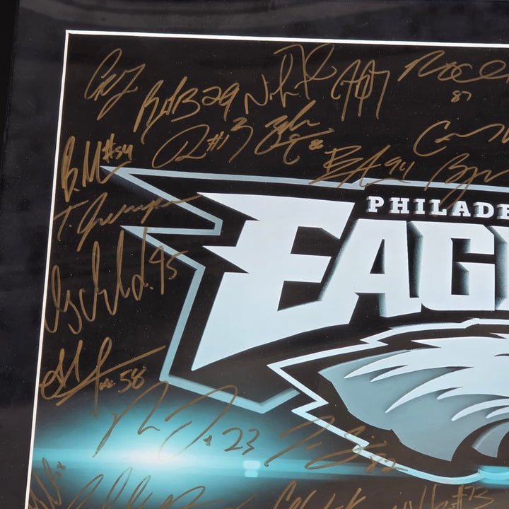 Philadelphia Eagles 2016-17 team signed 16x20 framed with proof.