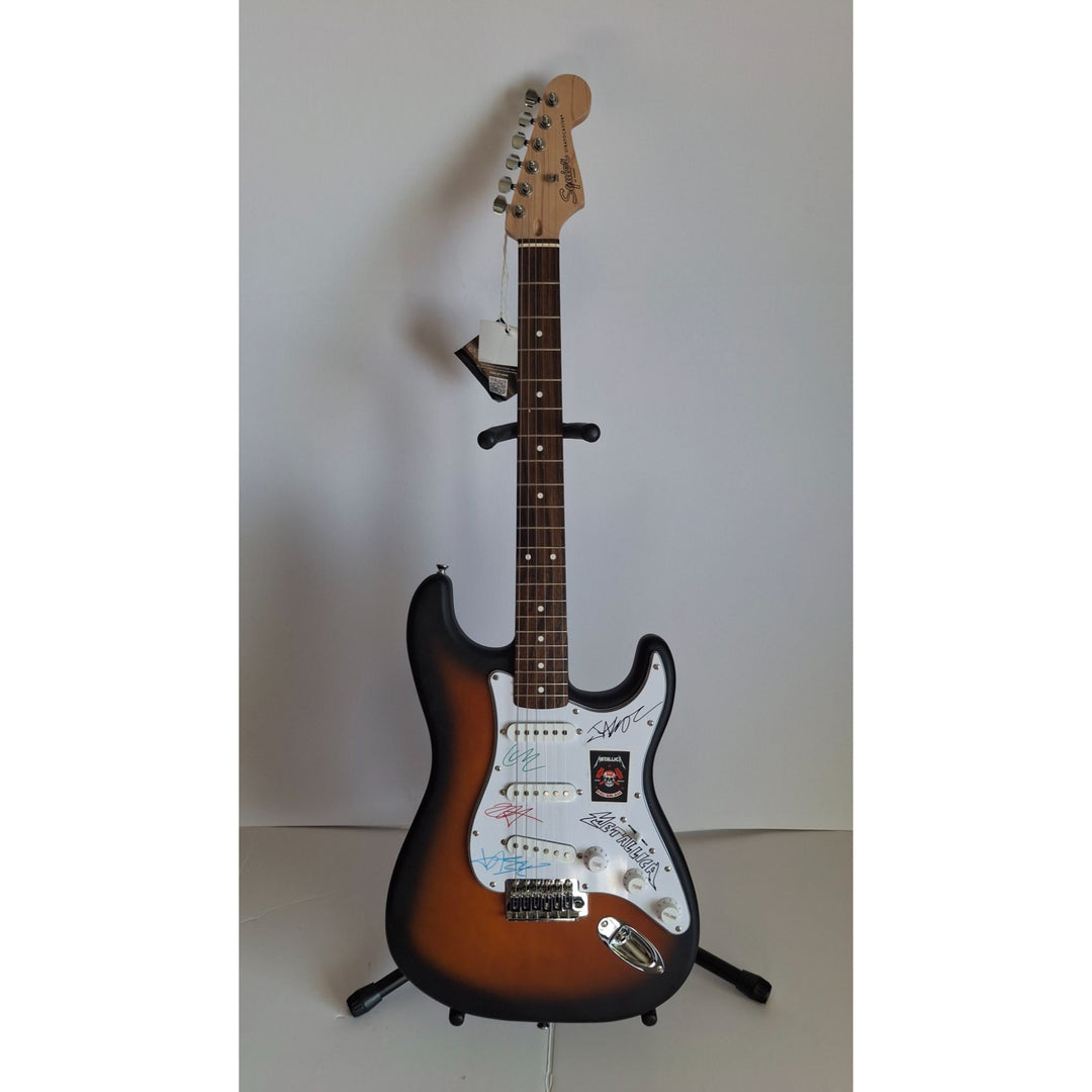 Metallica vintage signed James Hetfield, Lars Ulrich, Kirk Hammett, Jason Newst Fender Stratocaster Squier electric guitar signed with proof