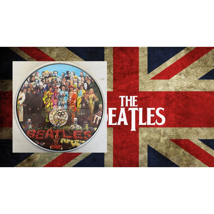 Sir George MartinRingo Starr Paul McCartney  drumhead signed with proof