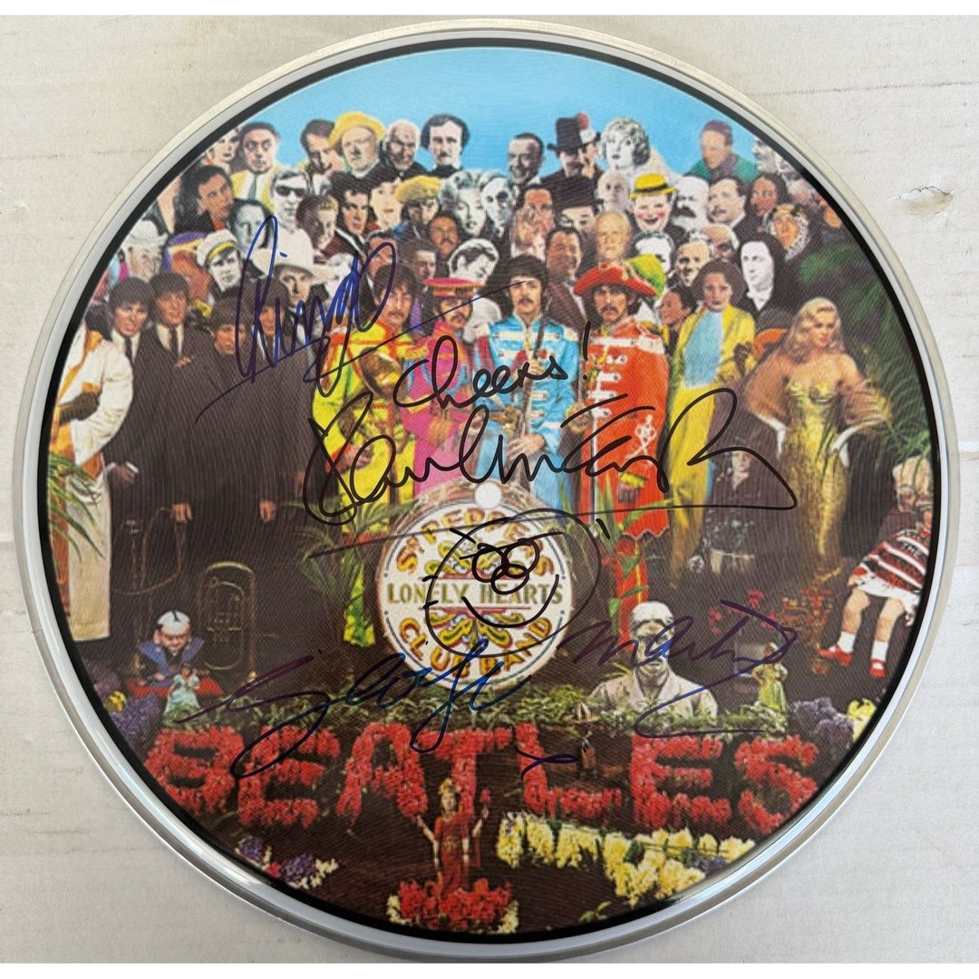 Sir George MartinRingo Starr Paul McCartney  drumhead signed with proof.