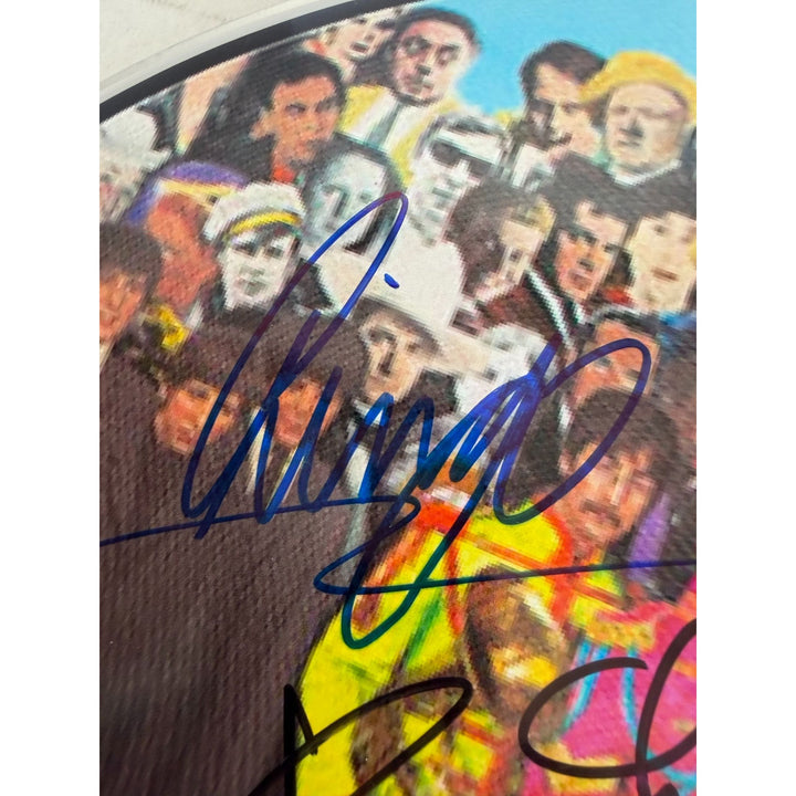 Sir George MartinRingo Starr Paul McCartney  drumhead signed with proof.