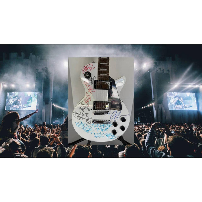 Beastie Boys, Run DMC, RATM, Public Enemy  white les paul electric guitar signed with proof.