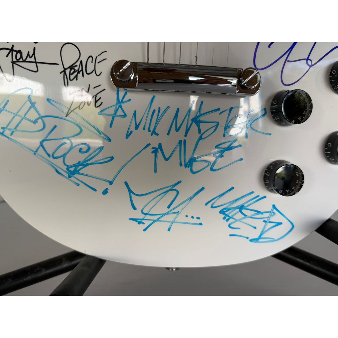 Beastie Boys, Run DMC, RATM, Public Enemy  white kes paul electric guitar signed with proof.
