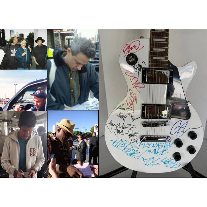 Beastie Boys, Run DMC, RATM, Public Enemy  white kes paul electric guitar signed with proof.