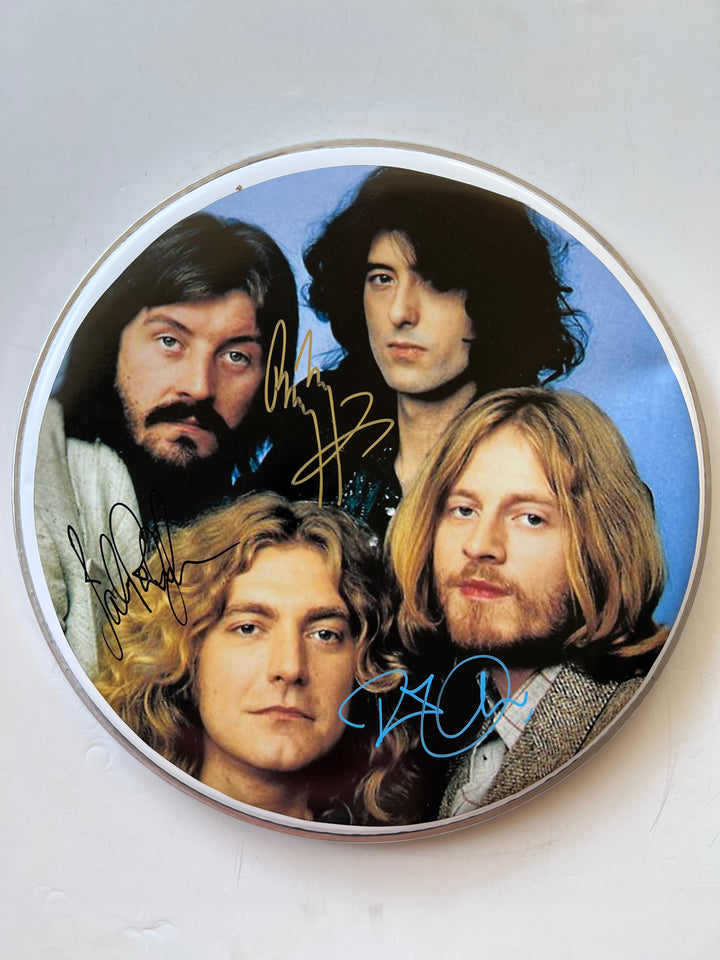 Led Zeppelin Robert Plant, Jimmy Page, John Paul Jones drumhead one-of-a-kind drumhead signed with proof