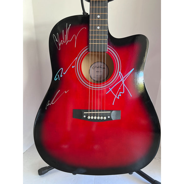 Nickelback  Chad Kroeger, Ryan Peake, Mike Kroeger, Daniel Adair 38' full size acoustic guitar signed with proof