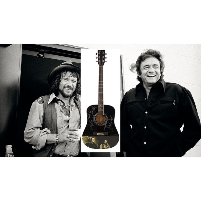 Waylon Jennings Johnny Cash black acoustic guitar signed with proof.
