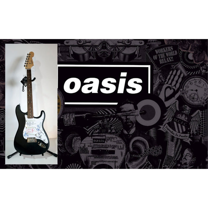 Oasis: Noel & Liam Gallagher, Fender Stratocaster electric guitar signed with proof