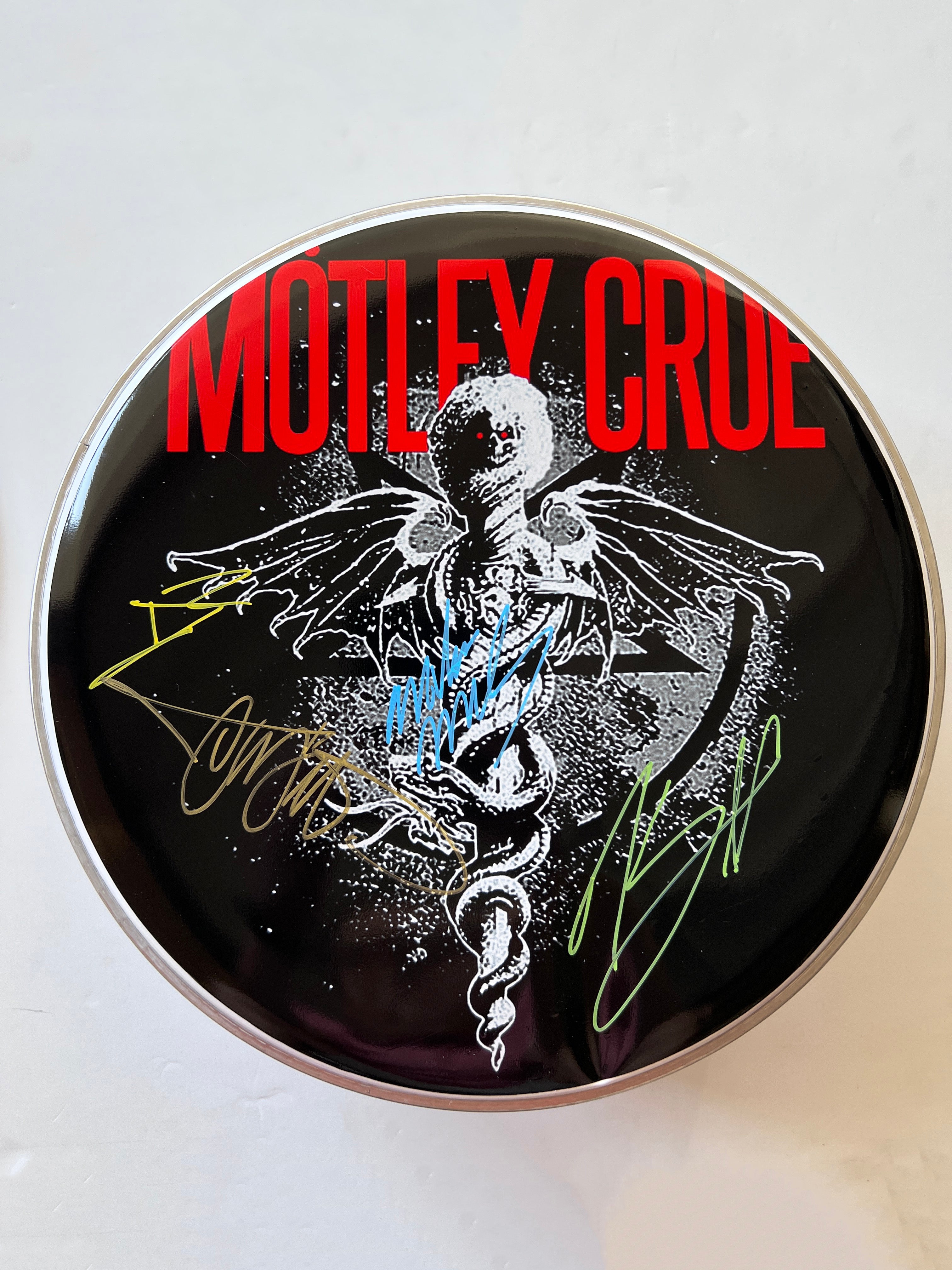 Mötley Crüe one-of-a-kind drumhead signed with proof