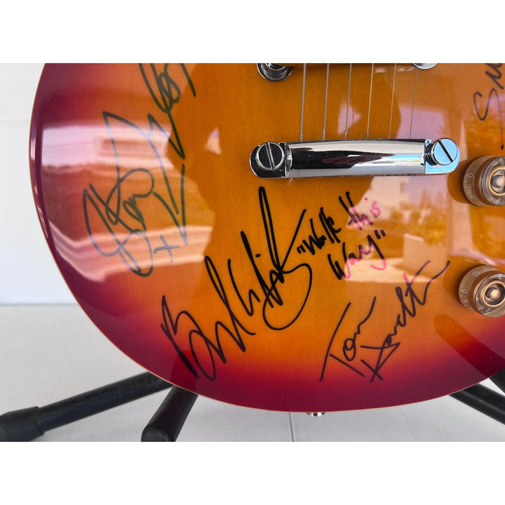 Aerosmith Steven Tyler , Joe Perry, Brad Whitford, Joey Kramer, Tom Hamilton vintage les paul full size electric signed with proof.