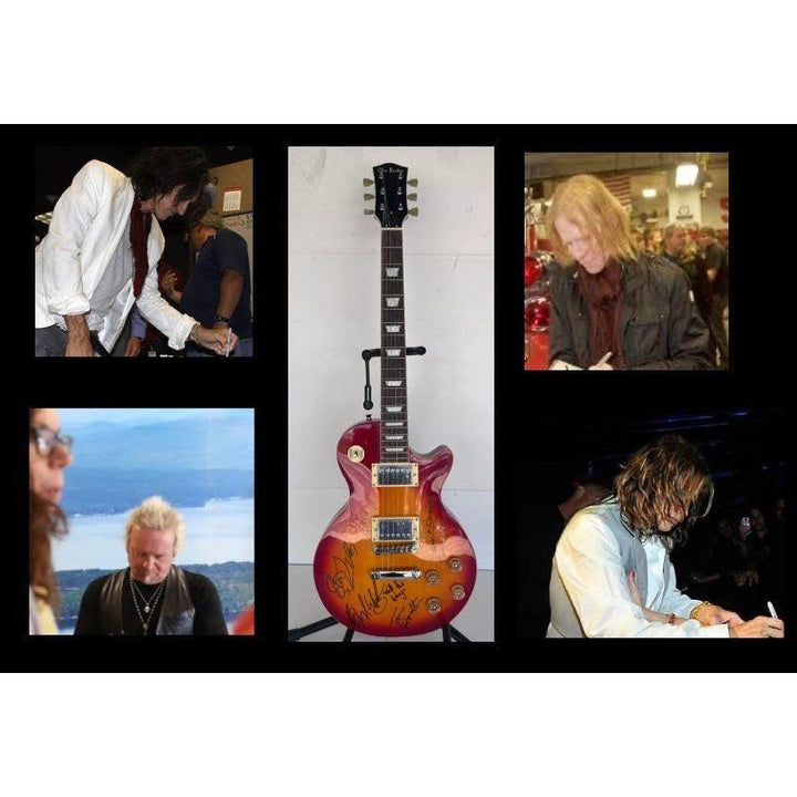 Aerosmith Steven Tyler , Joe Perry, Brad Whitford, Joey Kramer, Tom Hamilton vintage les paul full size electric signed with proof.