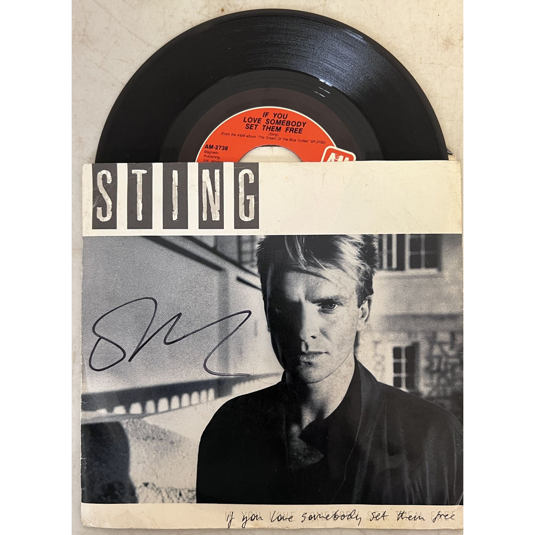 The Police Sting, Andy Summers, Stewart Copeland Ghost in the machine lp signed with proof.