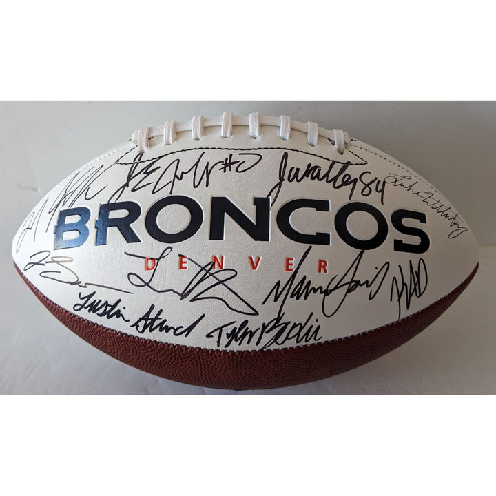 Denver Broncos 2025 team signed full size logo football with proof