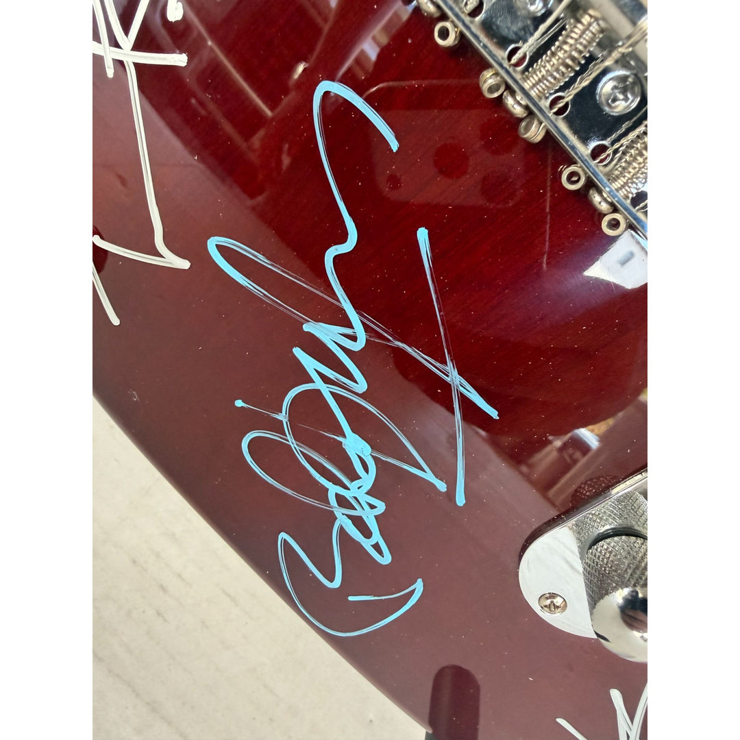 George Harrison Tom Petty Roy Orbison Bob Dylan Jeff Lynne the Traveling Wilburys vintage electric guitar sign with proof.