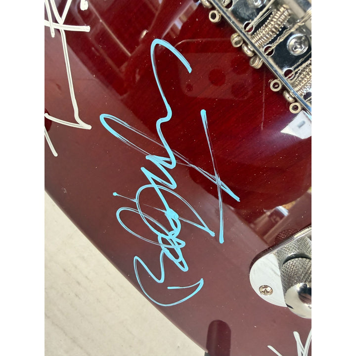 George Harrison Tom Petty Roy Orbison Bob Dylan Jeff Lynne the Traveling Wilburys vintage electric guitar sign with proof.