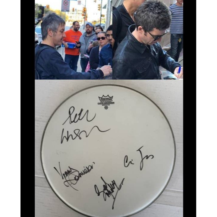 Oasis one-of-a-kind drumhead signed with proof.