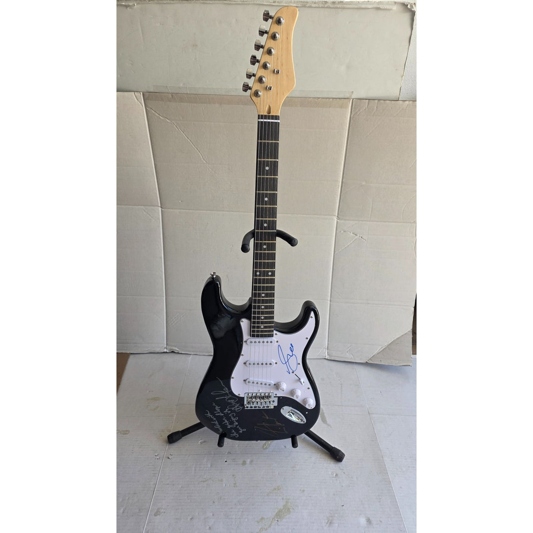 Geddy Lee Alex Lifeson Neil Peart Rush Stratocaster electric guitar signed with proof.