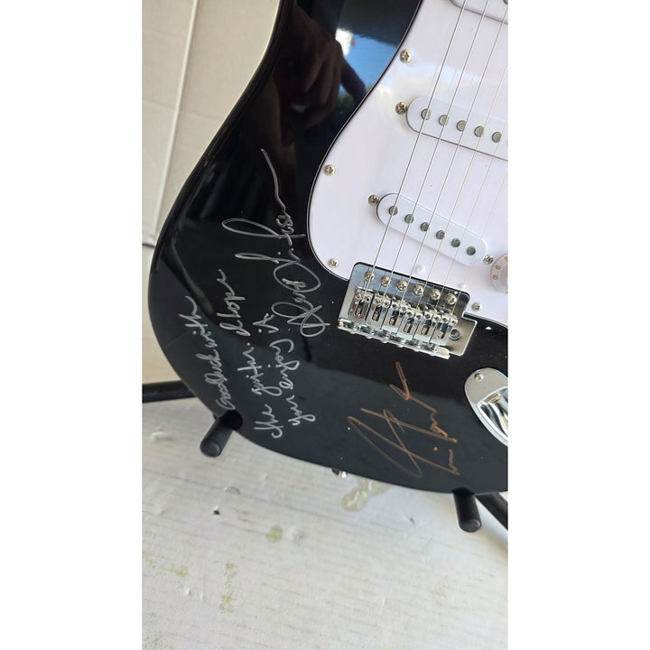 Geddy Lee Alex Lifeson Neil Peart Rush Stratocaster electric guitar signed with proof.