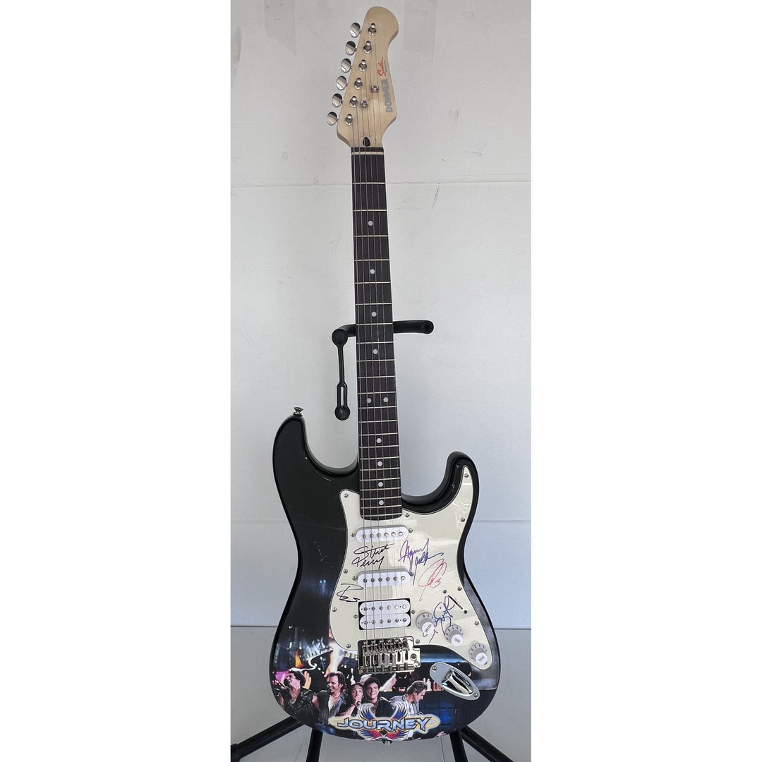 Neal Schon,  Ross Valory,  Jonathan Cain, Greg Rowley Steve Perry Journey band signed electric guitar with proof.