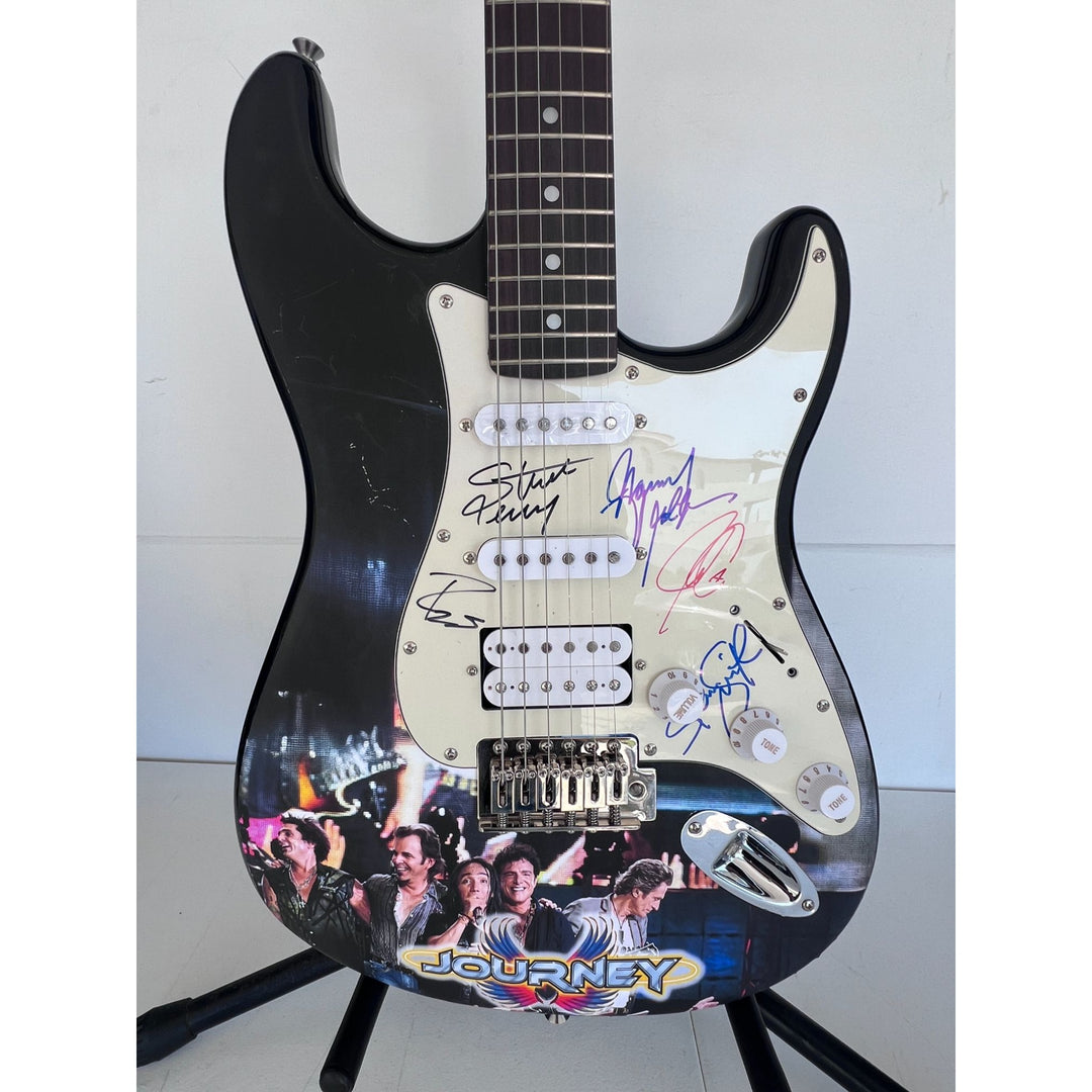 Neal Schon,  Ross Valory,  Jonathan Cain, Greg Rowley Steve Perry Journey band signed electric guitar with proof.