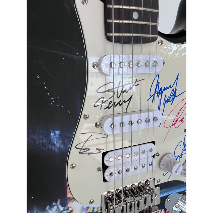 Neal Schon,  Ross Valory,  Jonathan Cain, Greg Rowley Steve Perry Journey band signed electric guitar with proof.