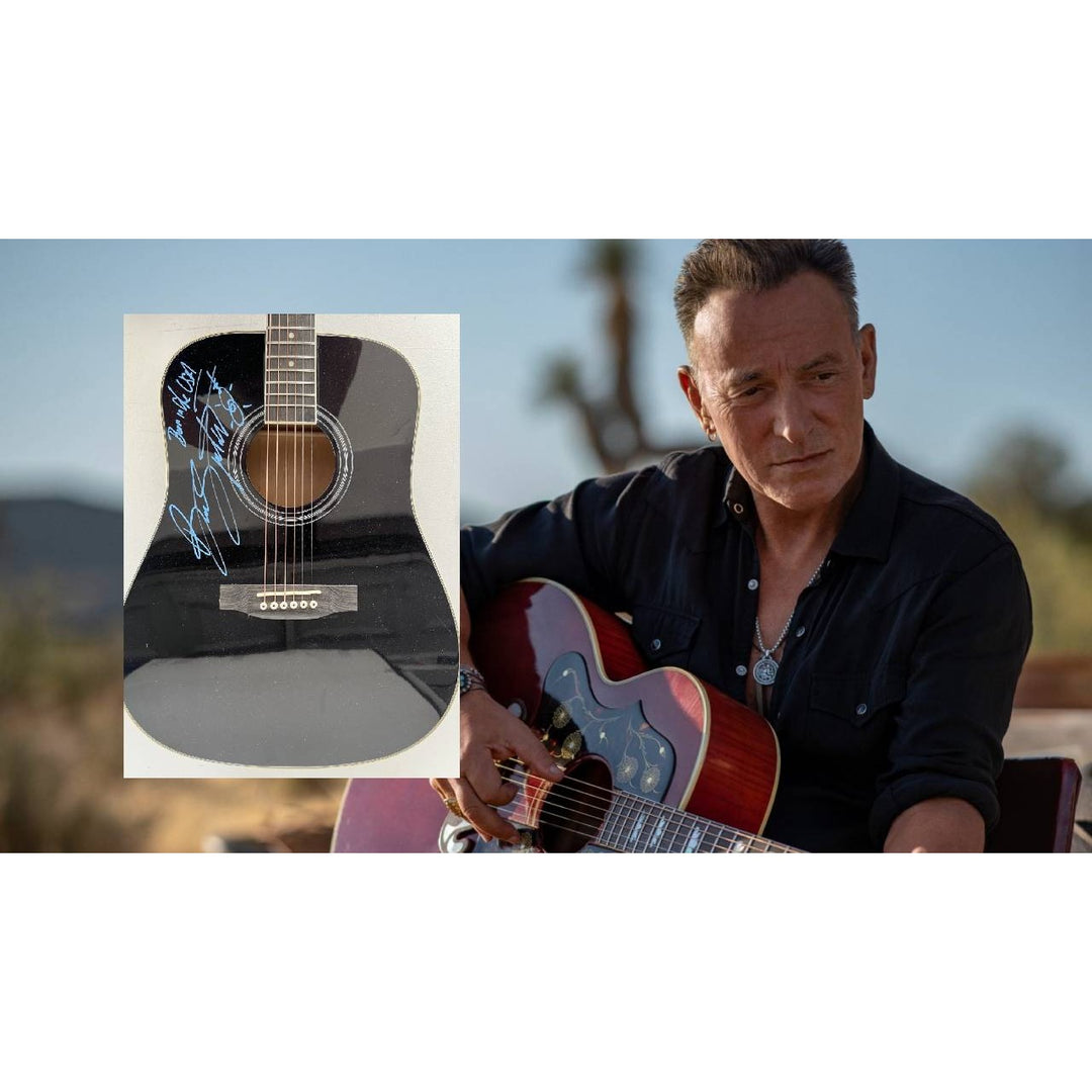 Bruce Springsteen full size black acoustic guitar signed with proof.