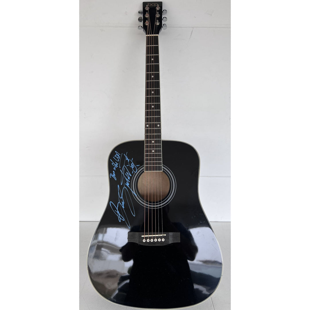 Bruce Springsteen full size black acoustic guitar signed with proof.