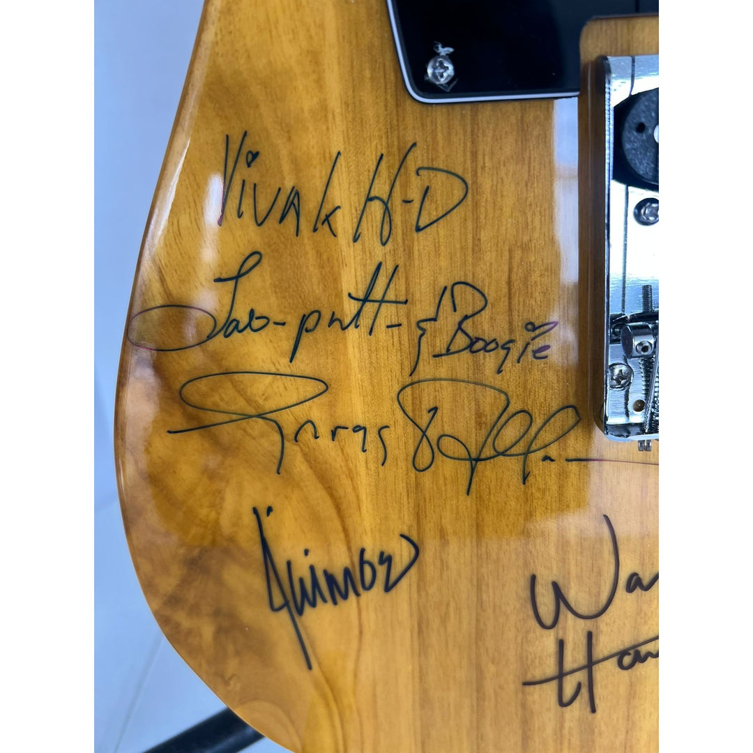 The Allman Brothers, Duane Allman, Greg Allman,  Butch Trucks,  Dickey Betts, Warren Haynes, Johanny Johanson 8 sigs in all guitar