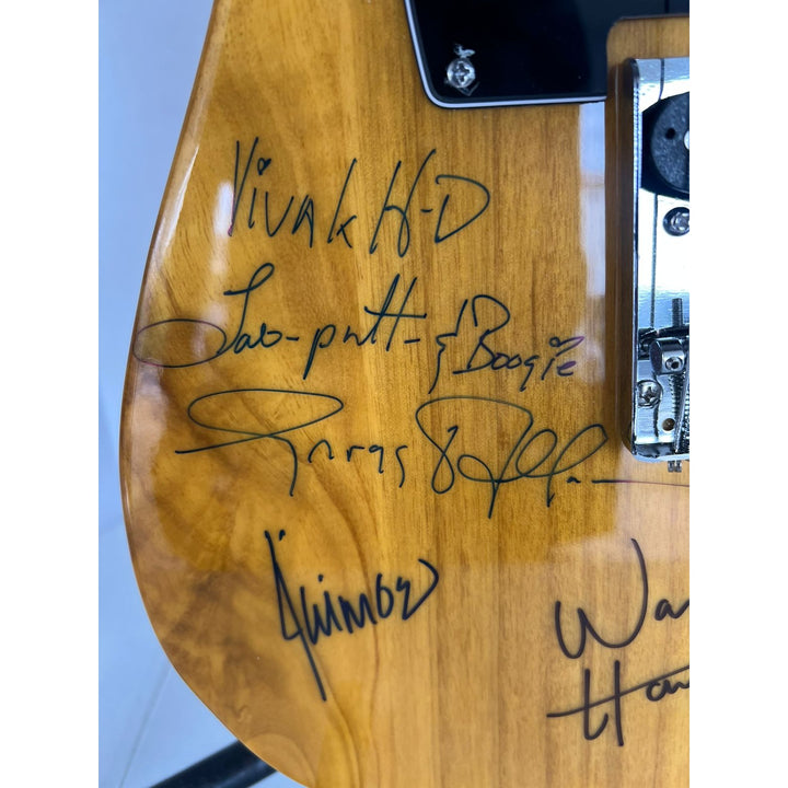 The Allman Brothers, Duane Allman, Greg Allman,  Butch Trucks,  Dickey Betts, Warren Haynes, Johanny Johanson 8 sigs in all guitar