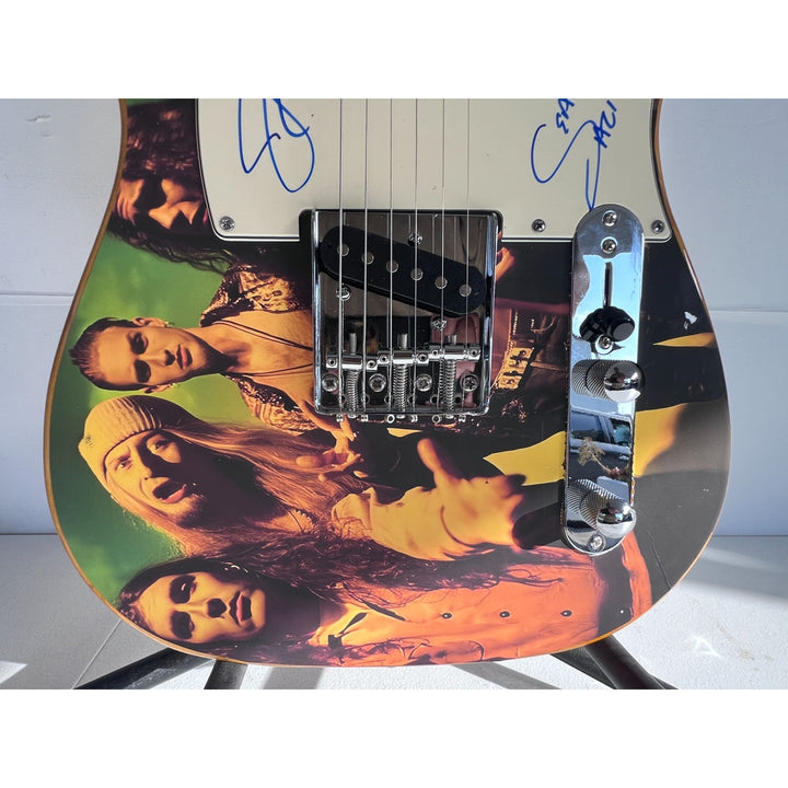 Alice in Chains Hand signed by Layne Staley, Jerry Cantrell, Mike Starr, and Sean Kinney telecaster electric guitar signed with proof..