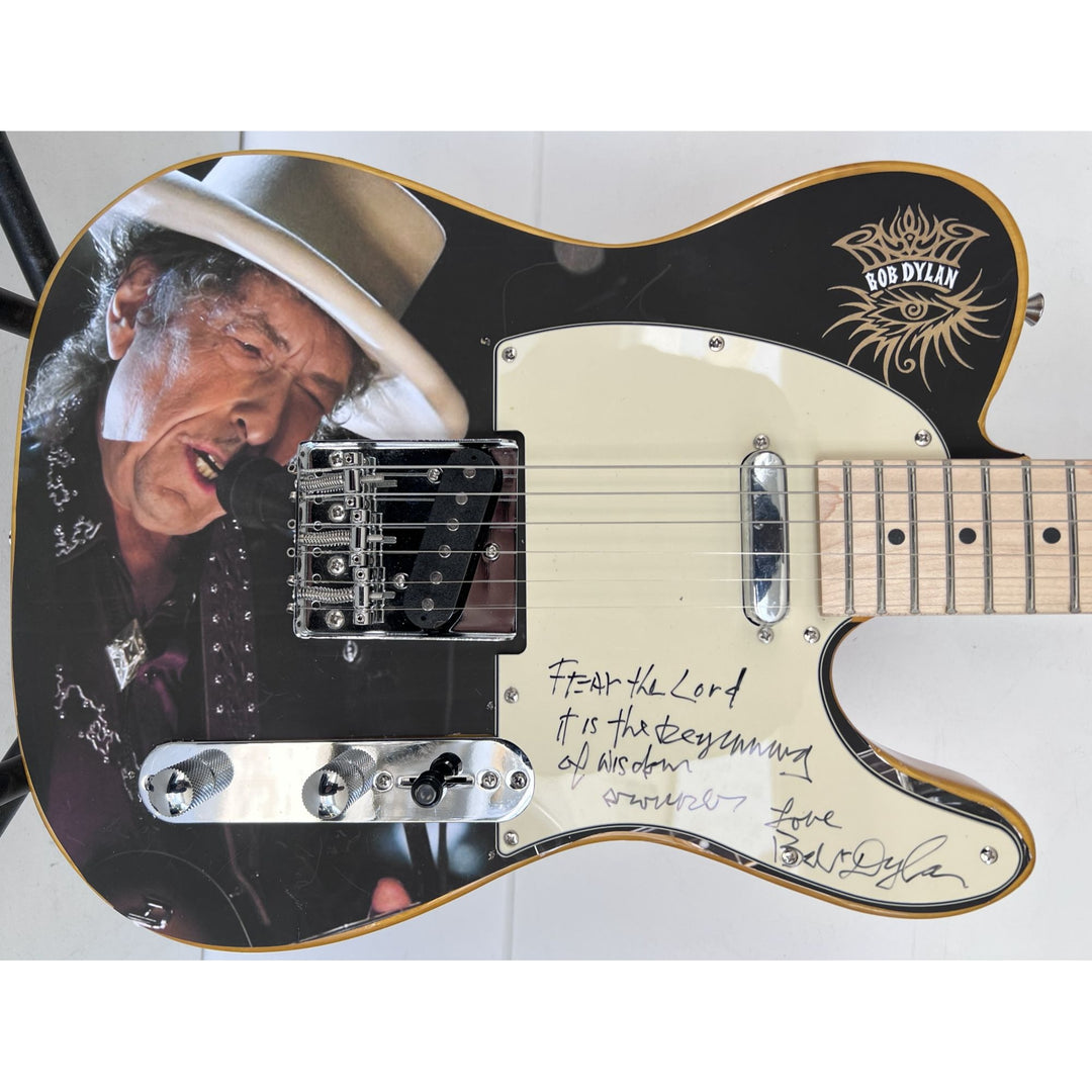 Bob Dylan signed with inscription   one of a kind full size electric guitar signed with proof.