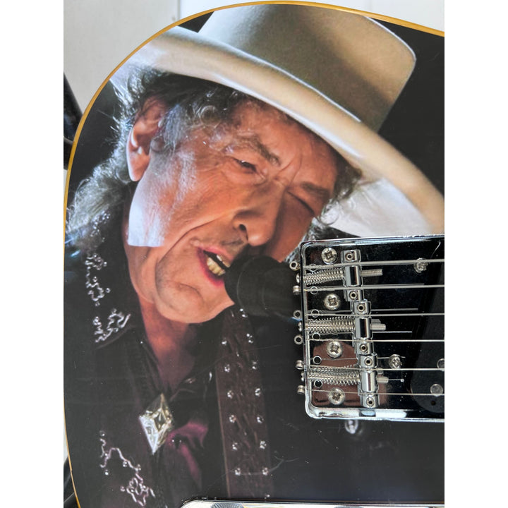 Bob Dylan signed with inscription   one of a kind full size electric guitar signed with proof.
